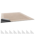 Rug pad with beige felt top layer and dark rubber backing, flat folded view