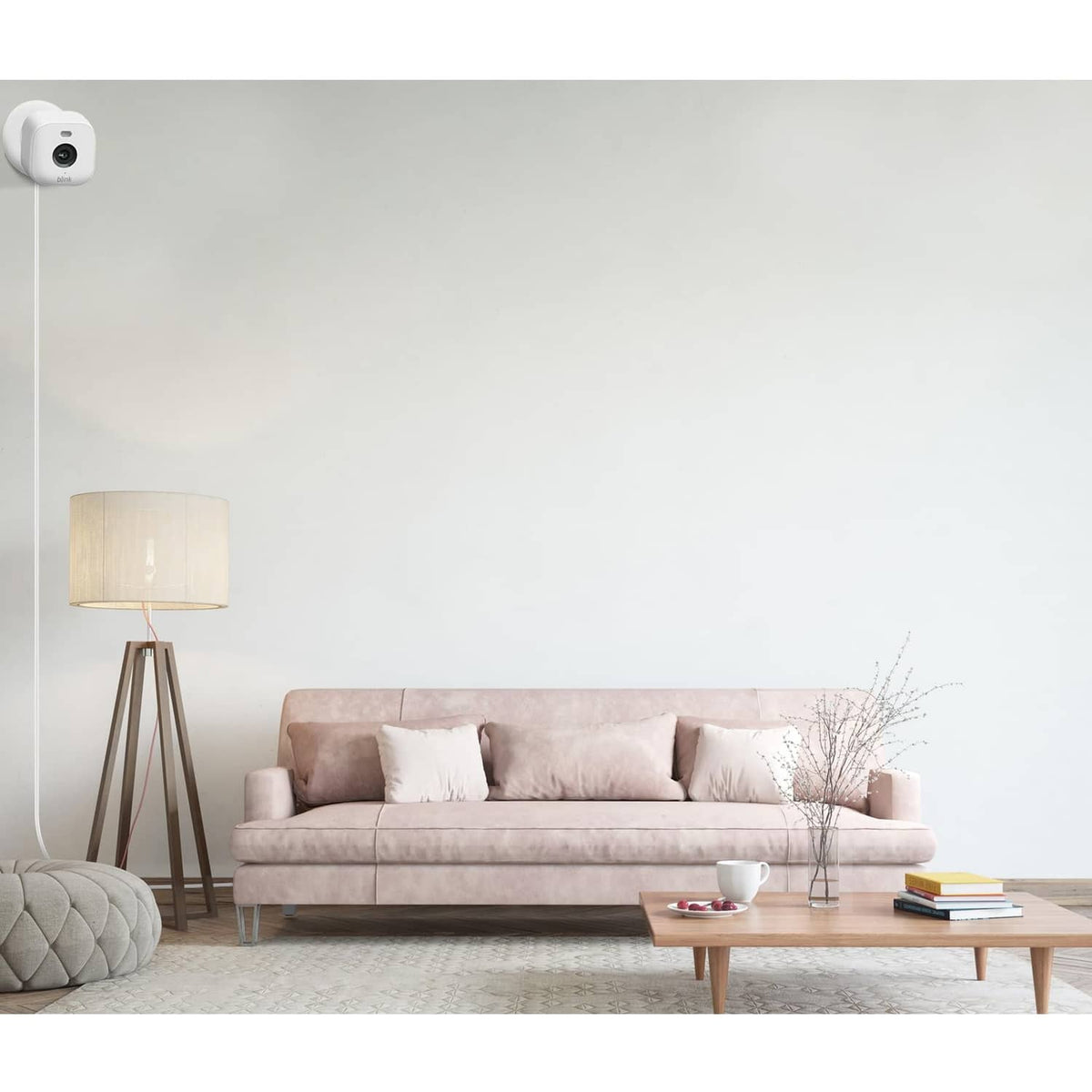 White USB-C power cable connected to an indoor security camera