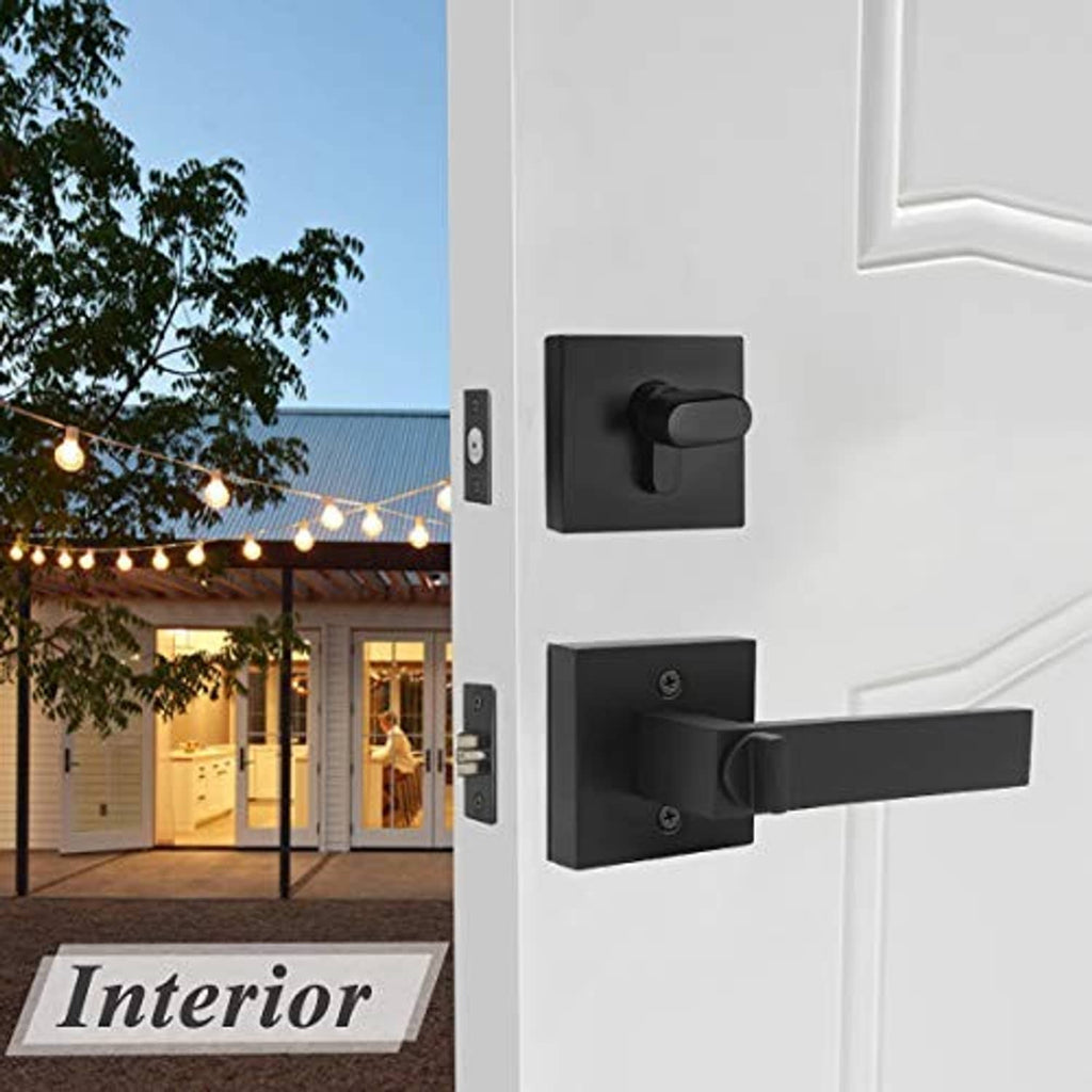 Black square lever and deadbolt on exterior door panel with brushed metal latch.