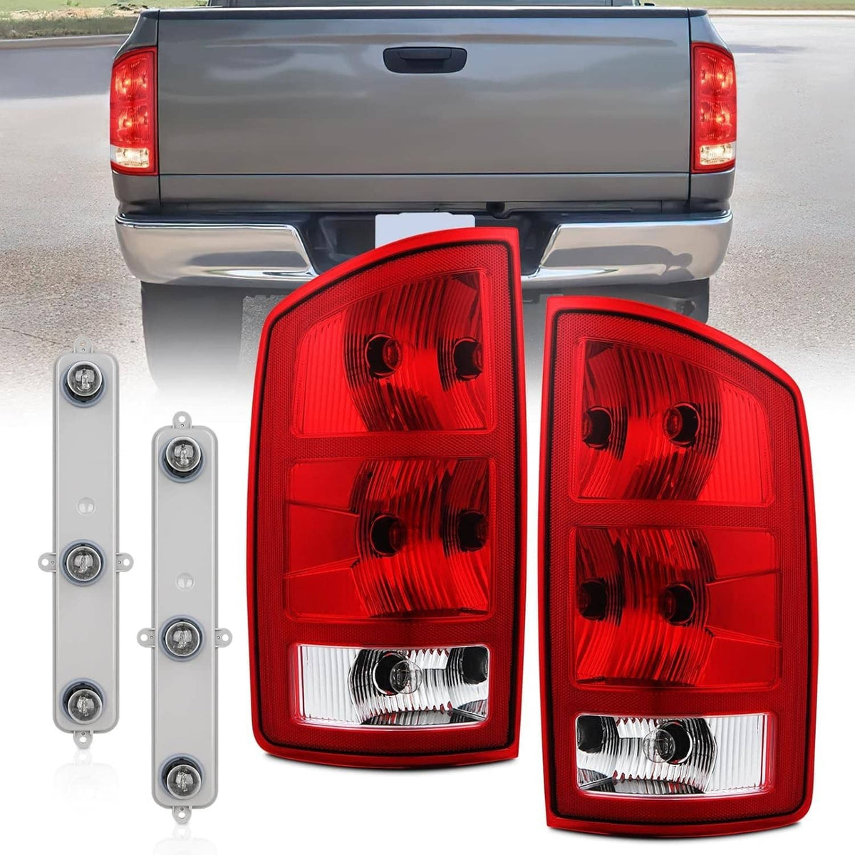 Close-up of two red tail light housings with white reverse lens panels