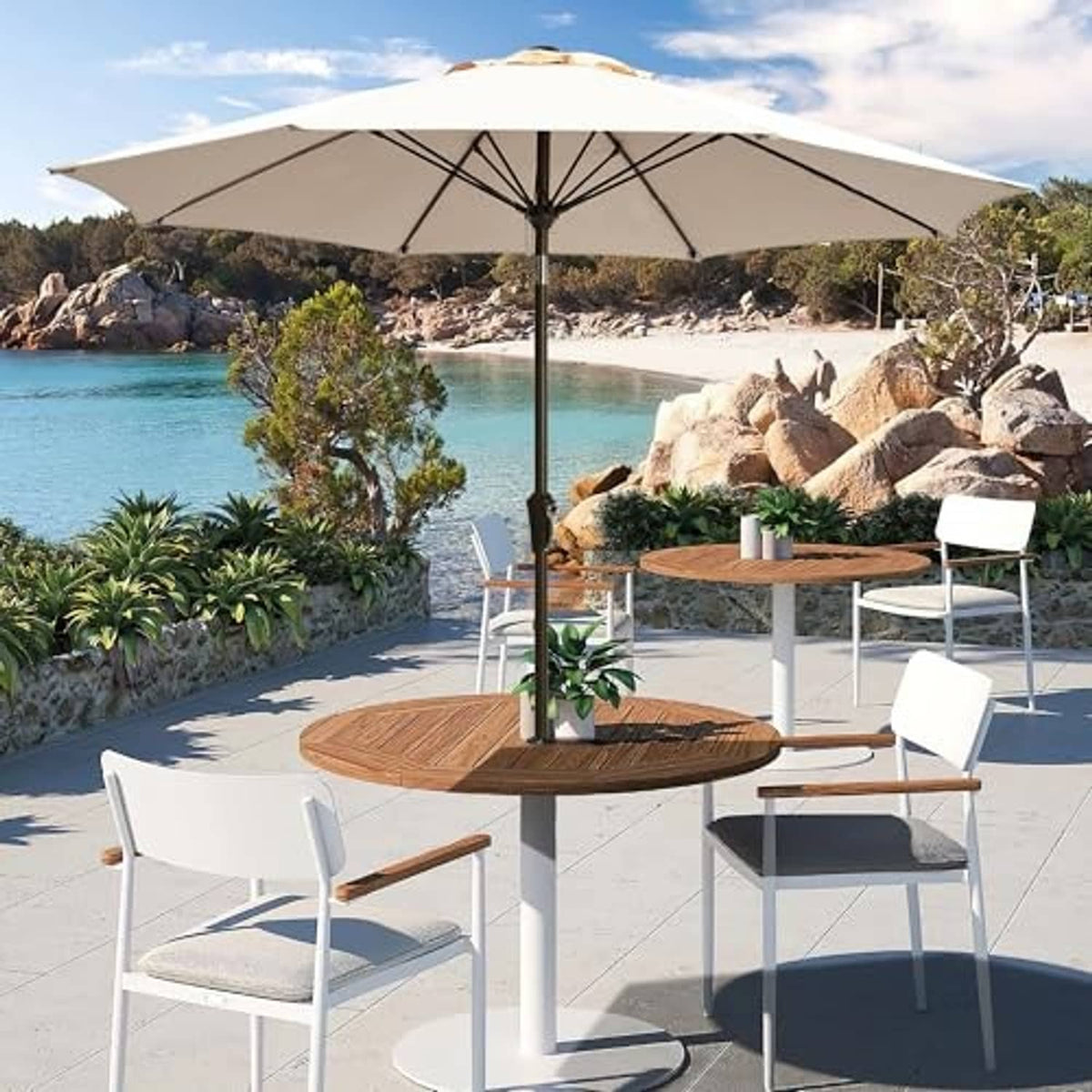 Taupe outdoor patio umbrella open above table and chairs with central pole