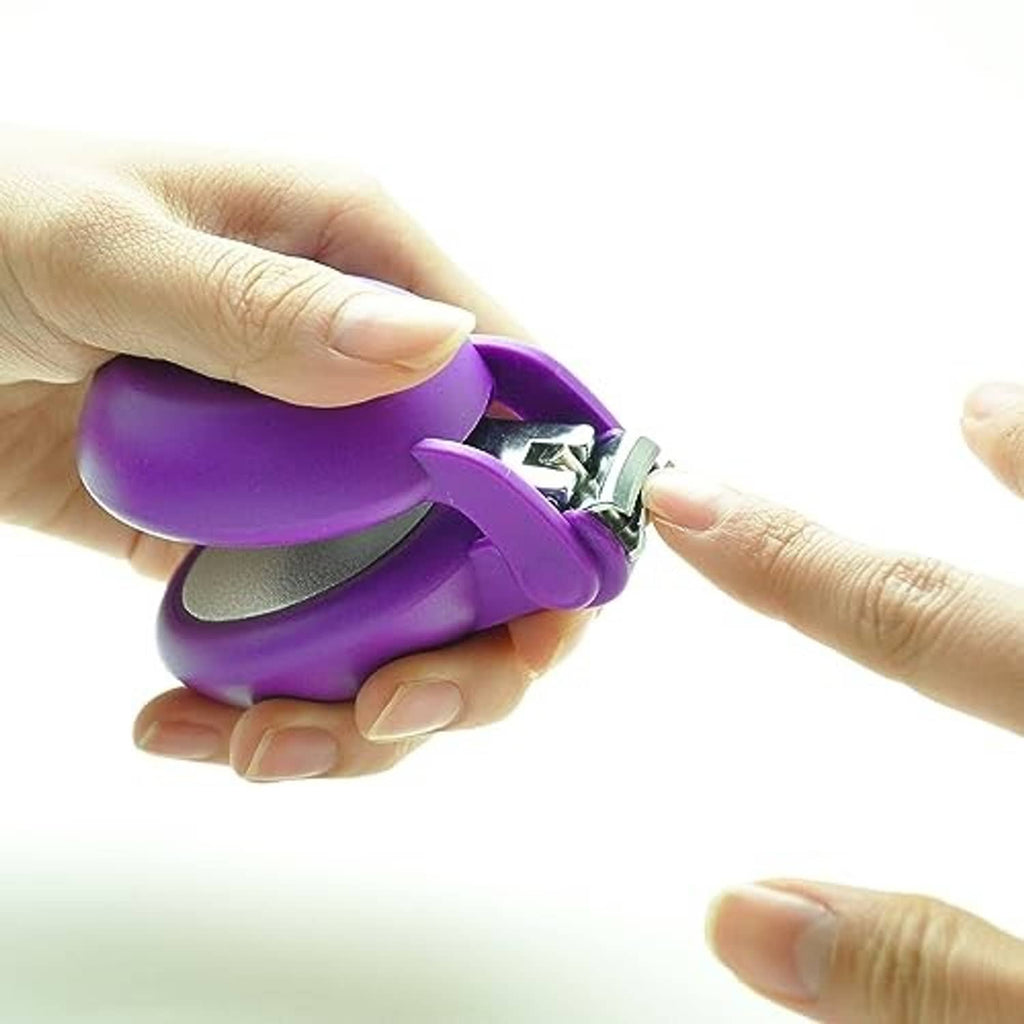 Purple nail clipper being used by hands; cushioned pad visible