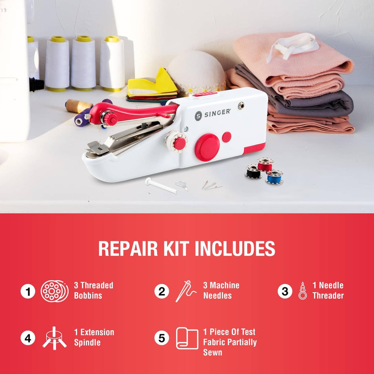 SINGER Stitch Sew Quick handheld cordless sewing machine with accessories on white surface