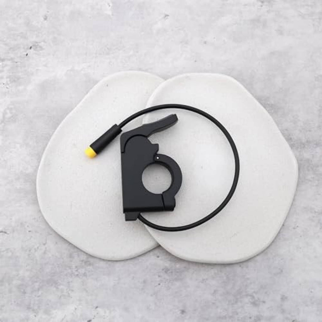 Electric bike thumb throttle component with black clamp, cable, and yellow 3-pin end