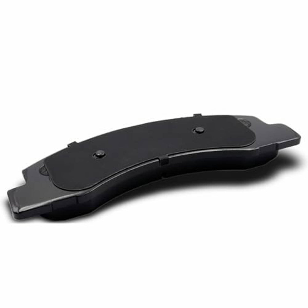 Ceramic brake pad rear side with black backing plate and mounting holes
