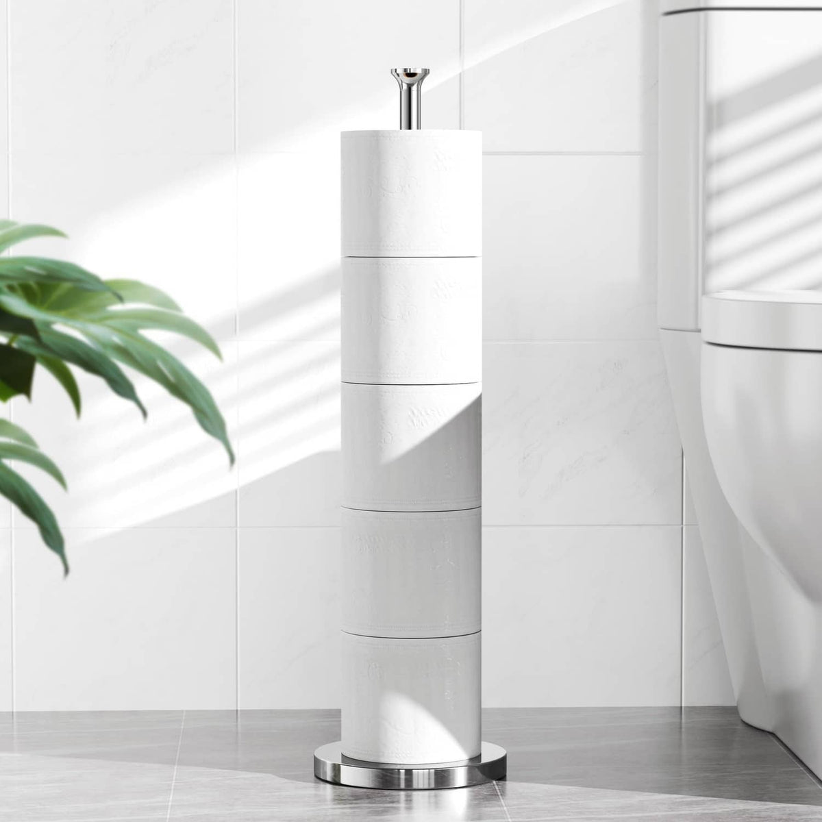 Chrome freestanding toilet paper holder stand with stacked toilet rolls