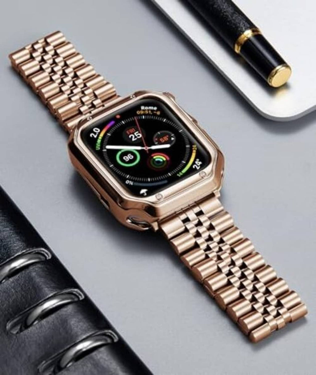 Rose gold metal link Apple Watch band with watch case, laid flat