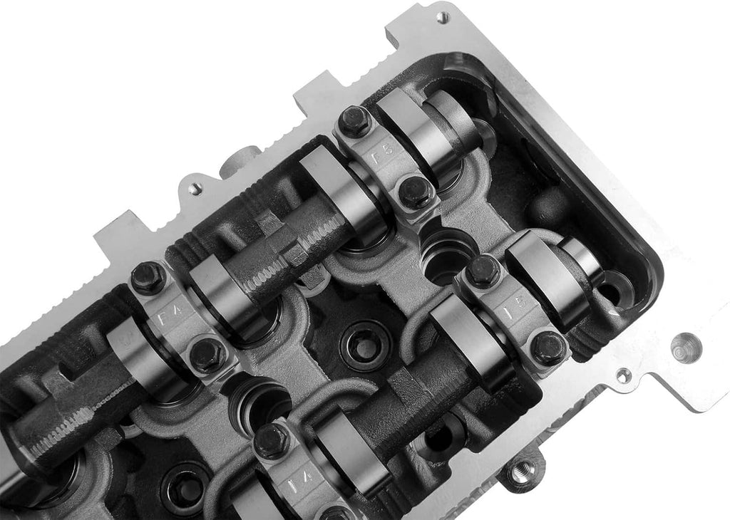 Cylinder head with rocker arms, camshaft assemblies, and timing gear details