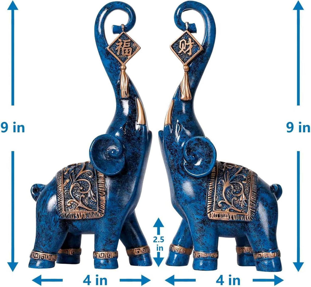 Pair of blue elephant luck statues with hanging diamond charms and gold accents