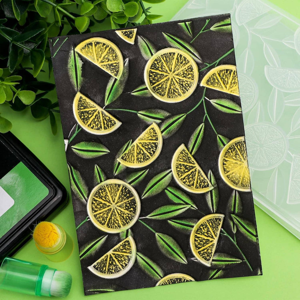 Embossed card panel with textured lemon slice pattern on dark paper