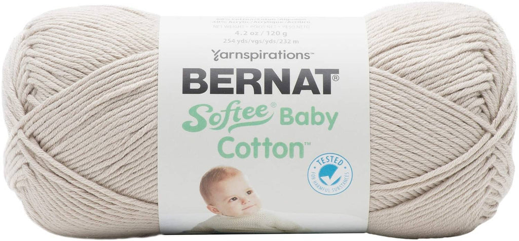Cream-beige yarn skein with label for Bernat Softie Baby Cotton