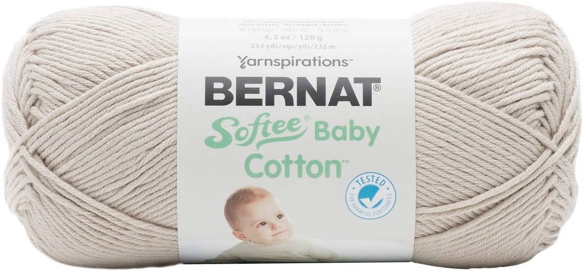 Cream-beige yarn skein with label for Bernat Softie Baby Cotton