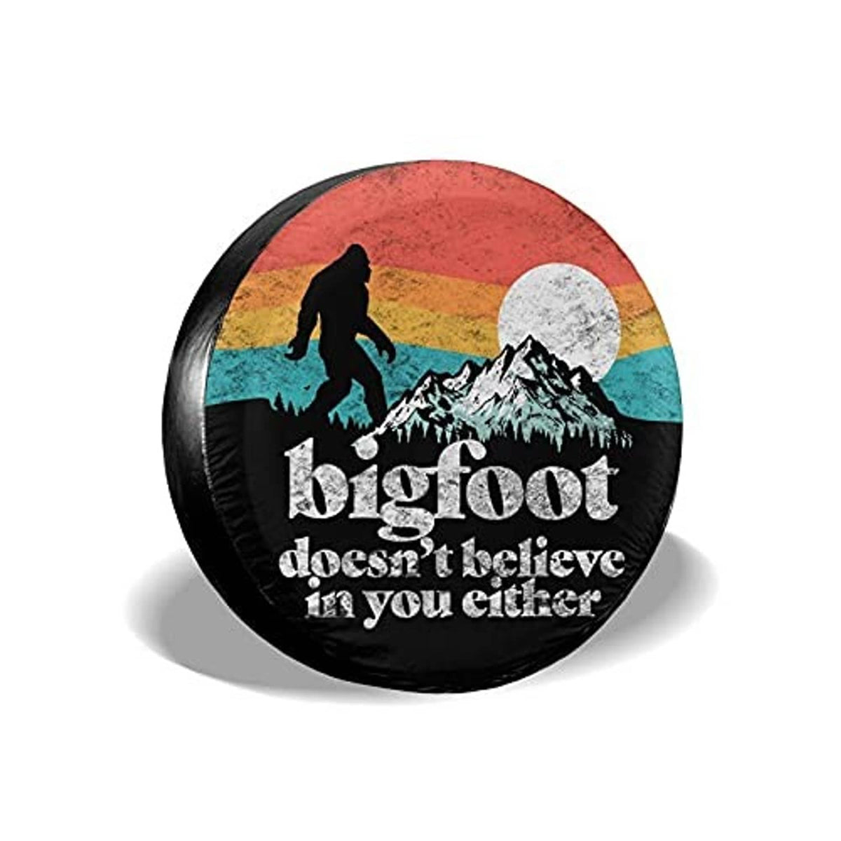Round black RV spare tire cover with Bigfoot print and colorful sunset band