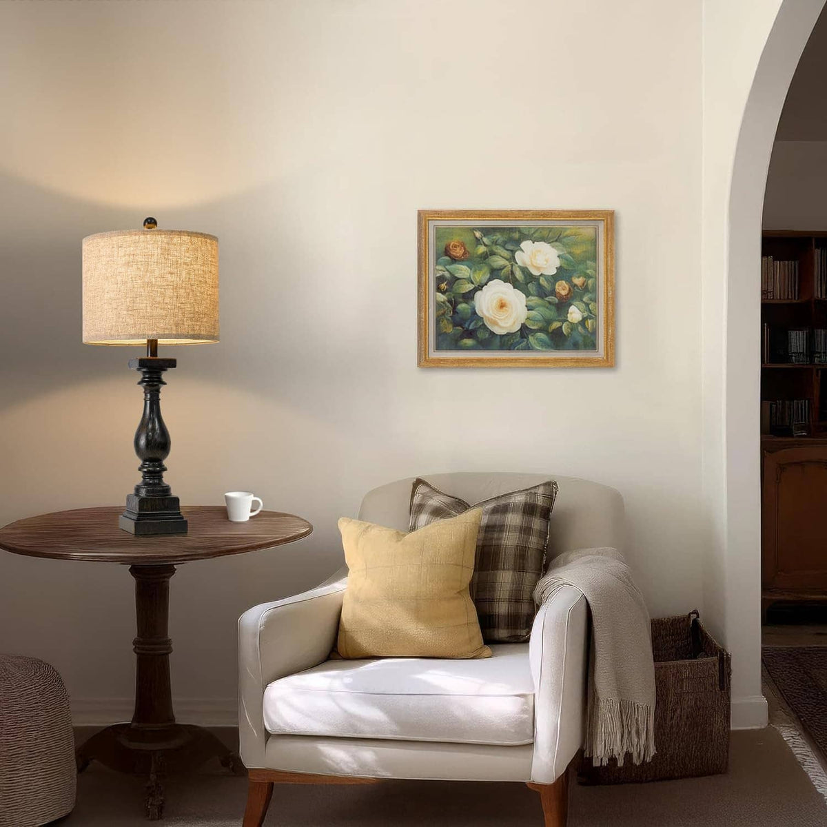 Farmhouse table lamp with beige drum shade and dark turned base on side table