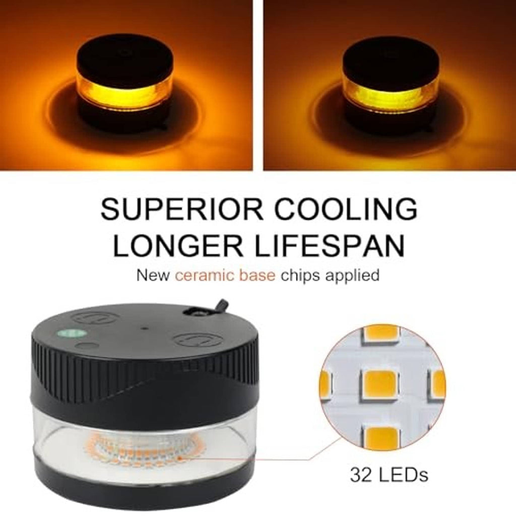 Round black LED strobe warning light with amber glow on multi-LED lens