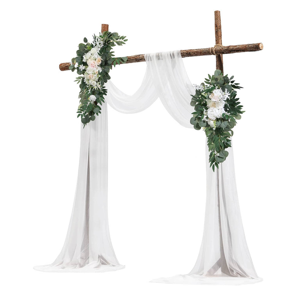 Artificial wedding arch with two floral corner garlands and flowing white sheer drapes