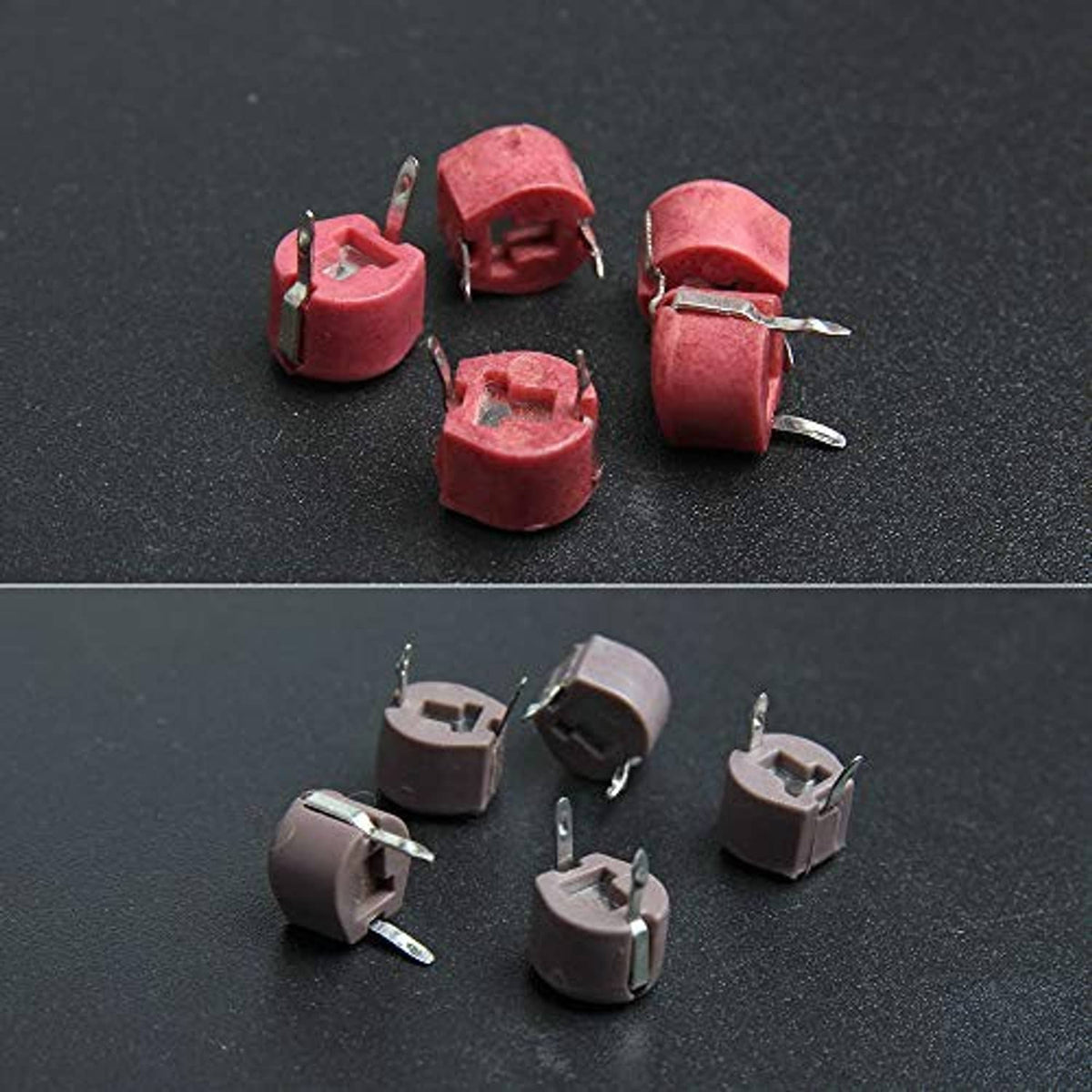 Assorted red trimmer capacitors with metal pins, round ceramic housings