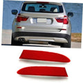 Pair of red rear bumper reflectors with textured lens, for left and right placement