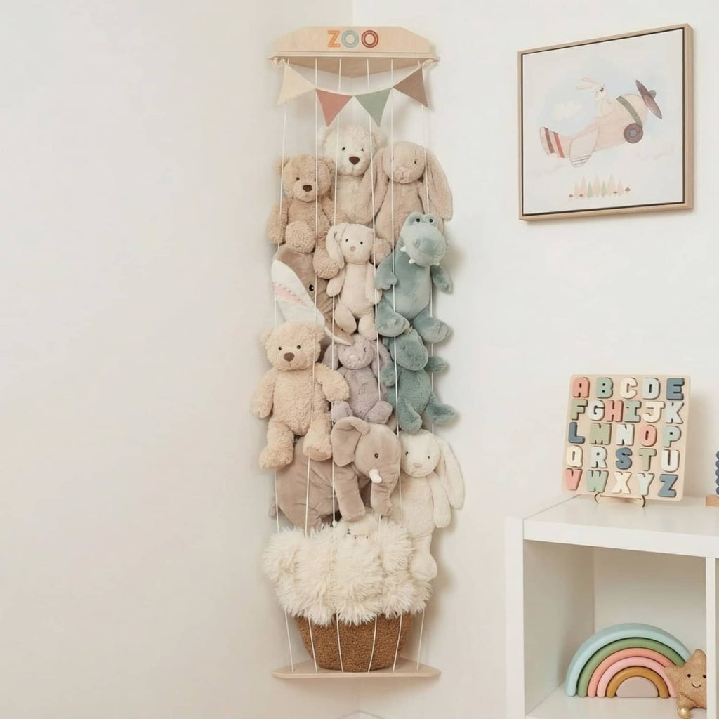 Corner wall stuffed animal storage with natural wood shelf and hanging rope net for plush toys
