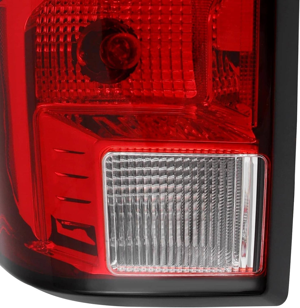 Left tail light close-up of red reflector grid with clear reverse lens