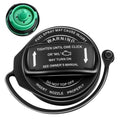 Fuel tank cap with black housing and green insert, warning label visible