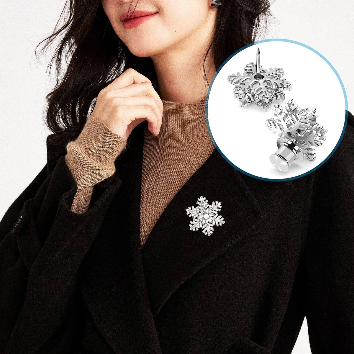 Silver locking pin back clasps with a snowflake brooch fastened on a lapel, visible cap.