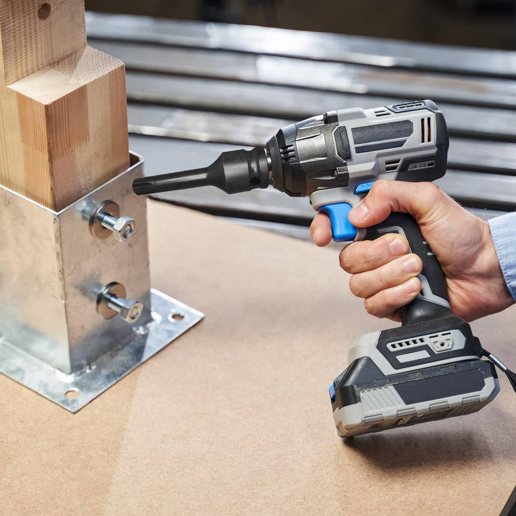 T40 Torx socket bit attached to a 1/2-inch impact driver, black steel