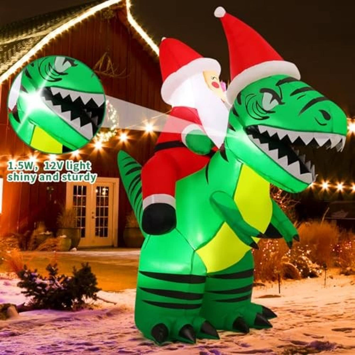 Inflatable Santa riding green crocodile with bright internal lights on snowy night