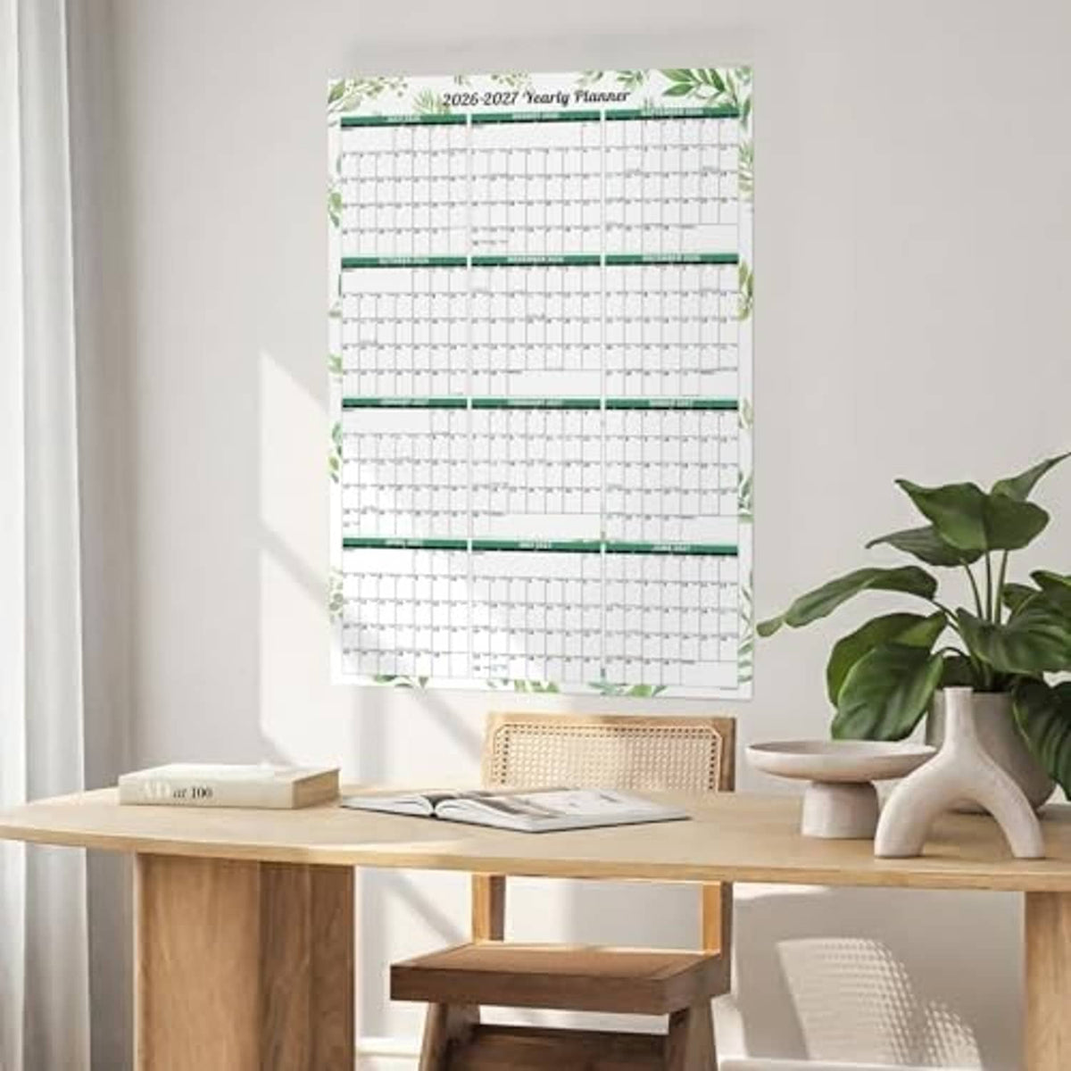 Laminated 2026–2027 wall dry-erase calendar with green plant design and monthly layout