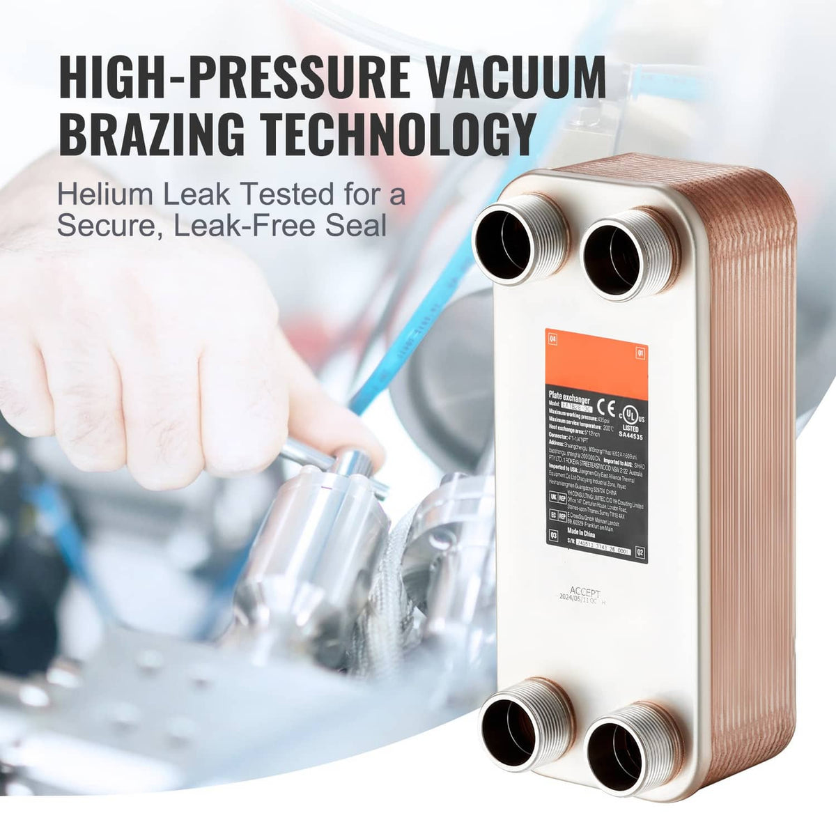 Copper-brazed plate heat exchanger with four threaded ports, helium leak-tested design.