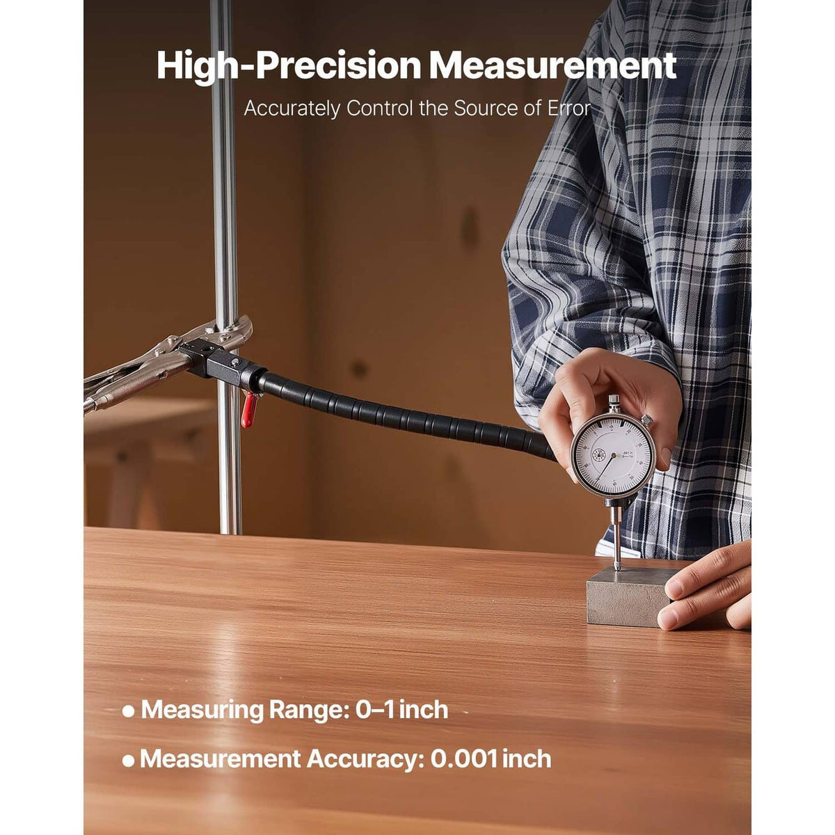 Dial test indicator with flexible arm clamped to rod; round gauge dial and probe visible