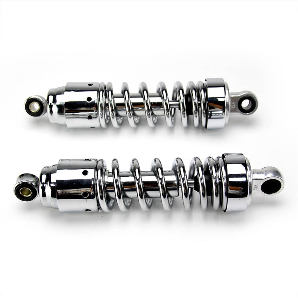 Pair of chrome rear shock absorbers laid out side-by-side, spring and eye mounts
