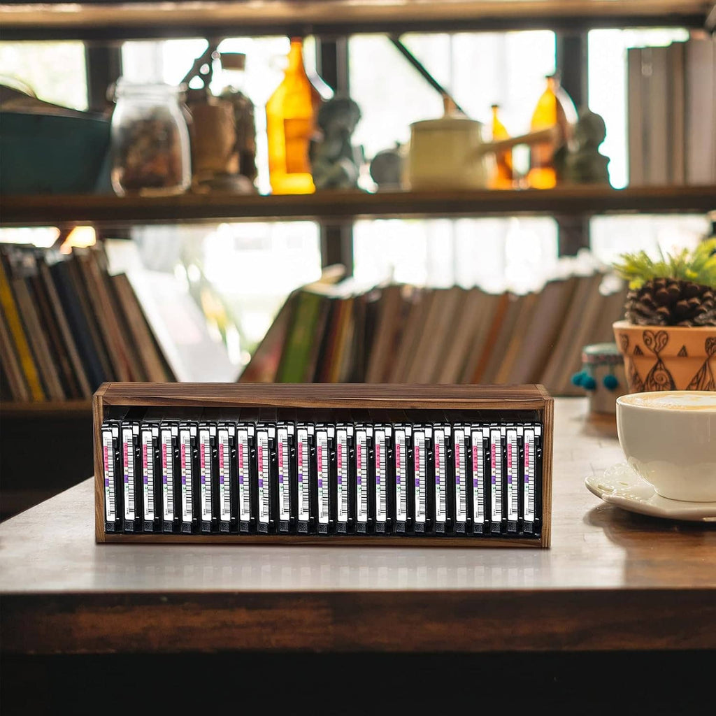Wooden cassette tape storage case with front opening and cassette tapes displayed