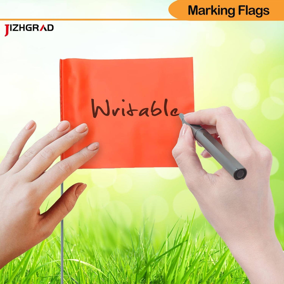 Writeable orange marking flag sheet, held with marker pen