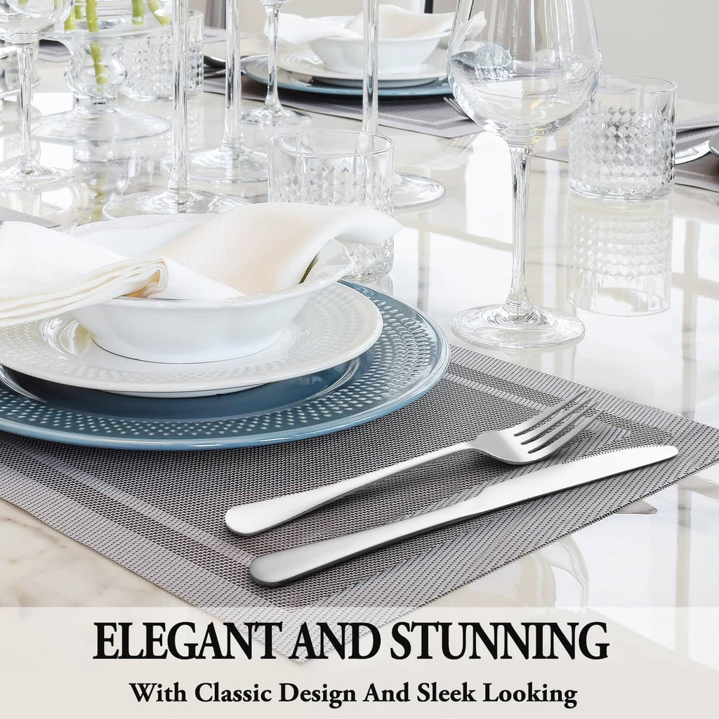 Stainless steel forks and spoons arranged in an elegant table setting