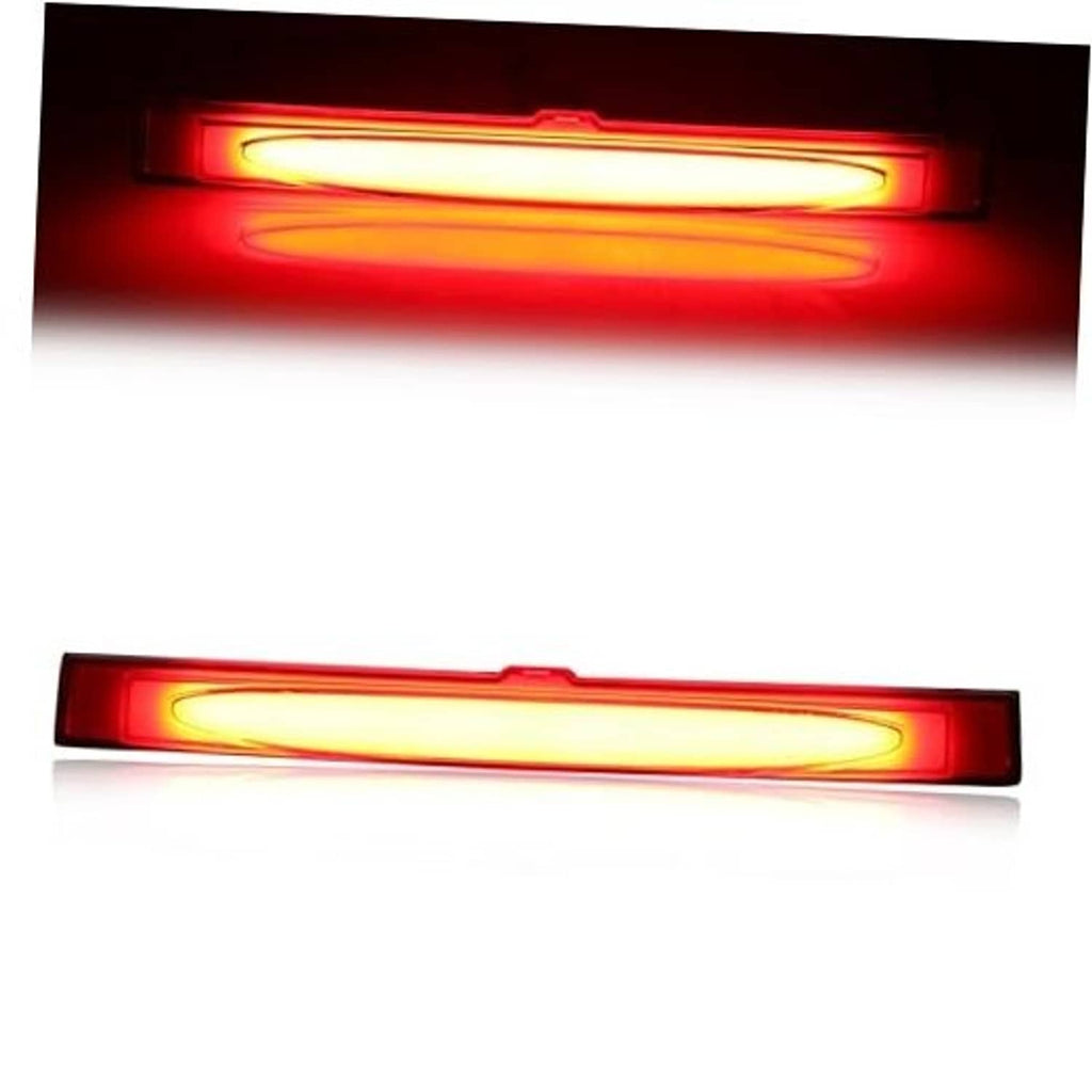 Red LED third brake light bar glowing with bright center light strip
