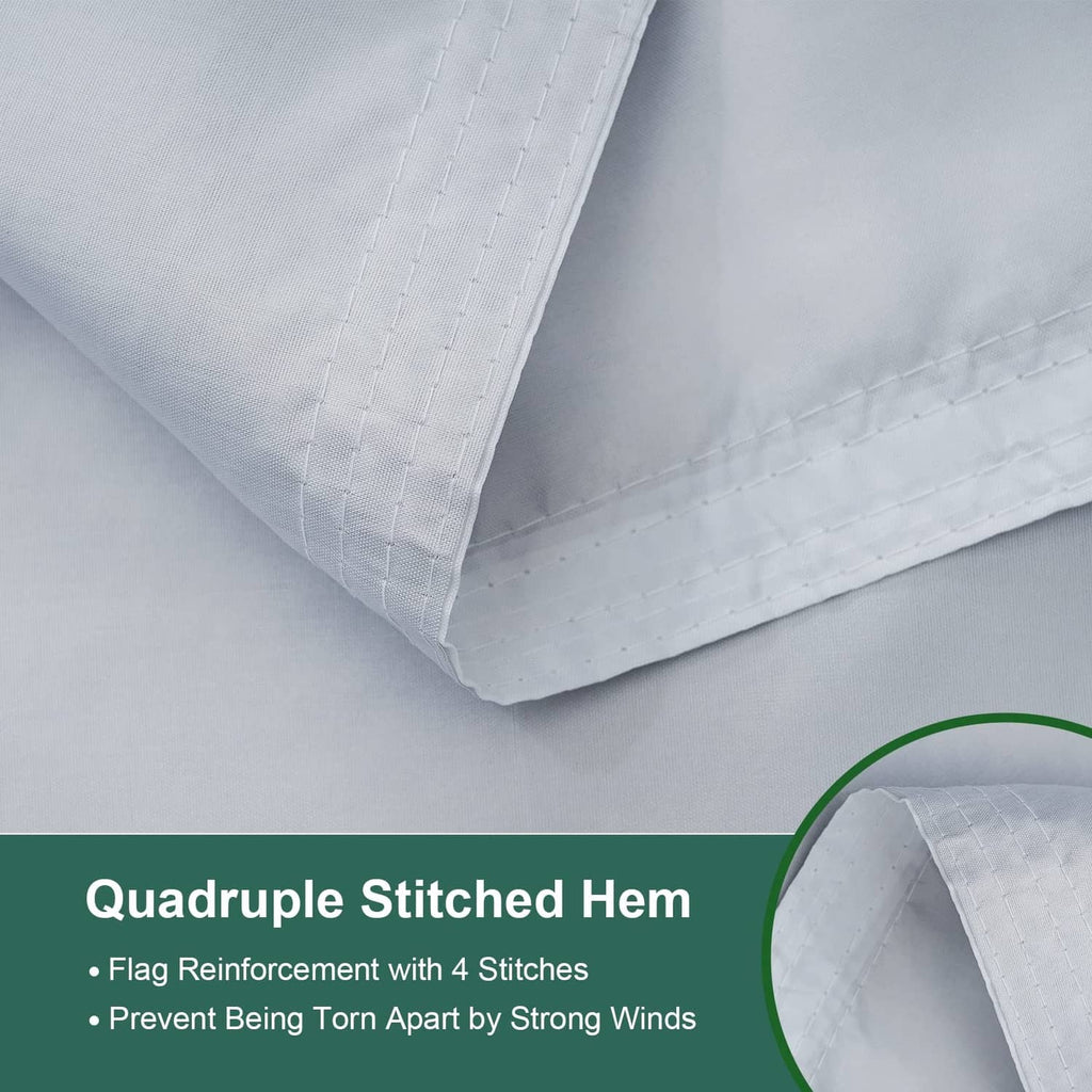 Outdoor flag corner with reinforced quadruple-stitched hem on white fabric