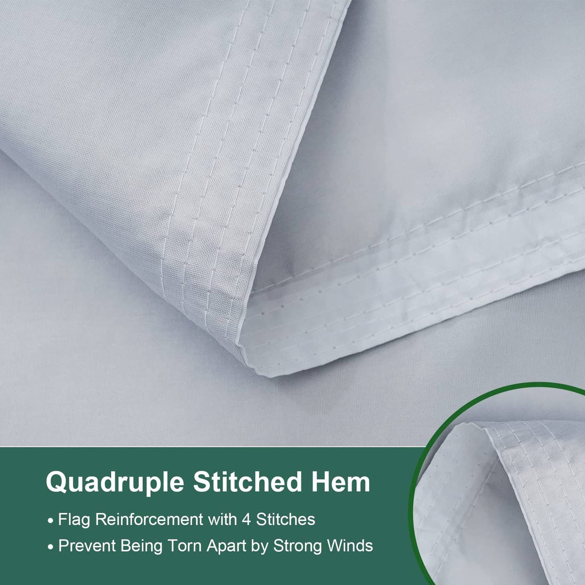 Outdoor flag corner with reinforced quadruple-stitched hem on white fabric