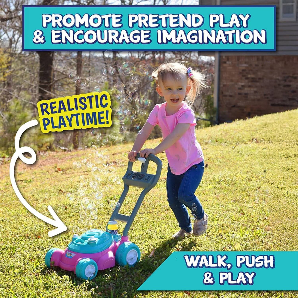 Teal-and-pink bubble lawn mower toy with gray handle and teal wheels on grass.