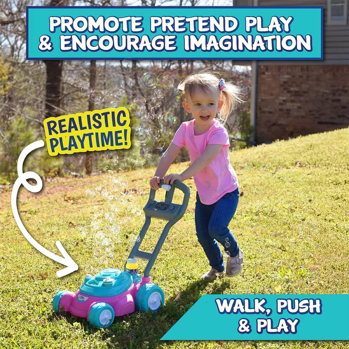 Teal-and-pink bubble lawn mower toy with gray handle and teal wheels on grass.