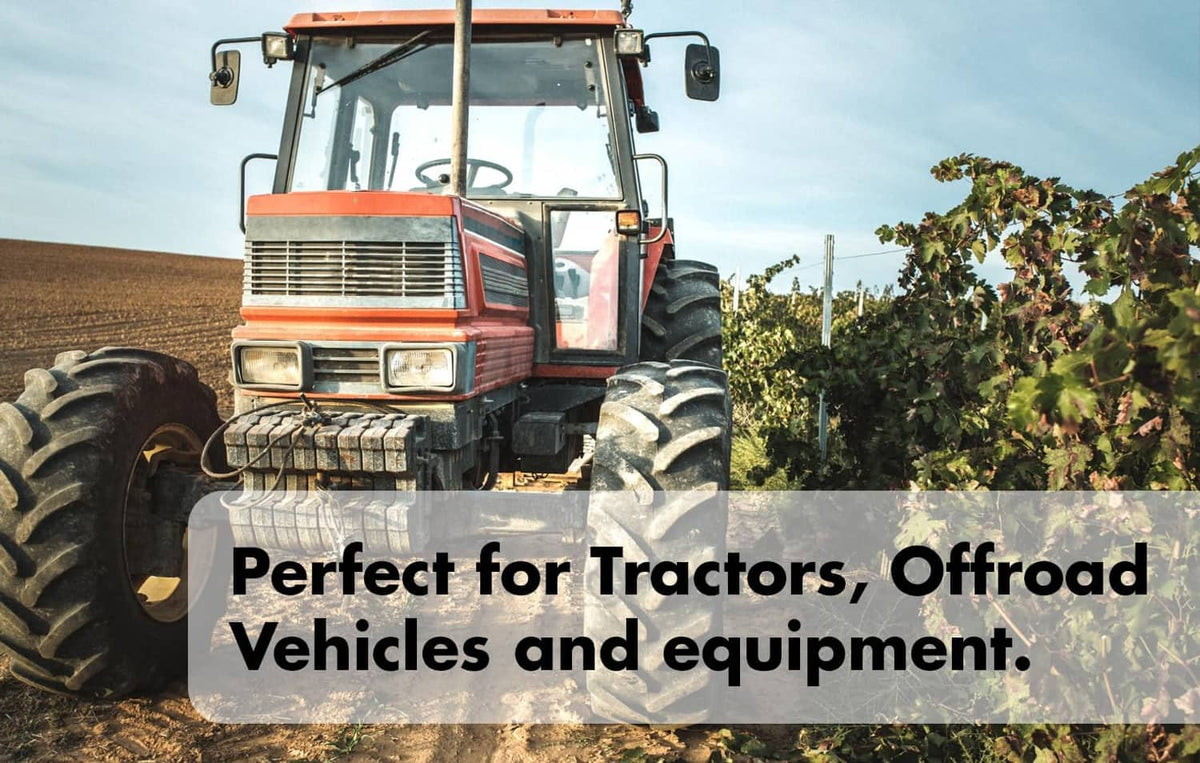 Red tractor outdoors showing MouseBlocker rodent protection for offroad vehicles and equipment