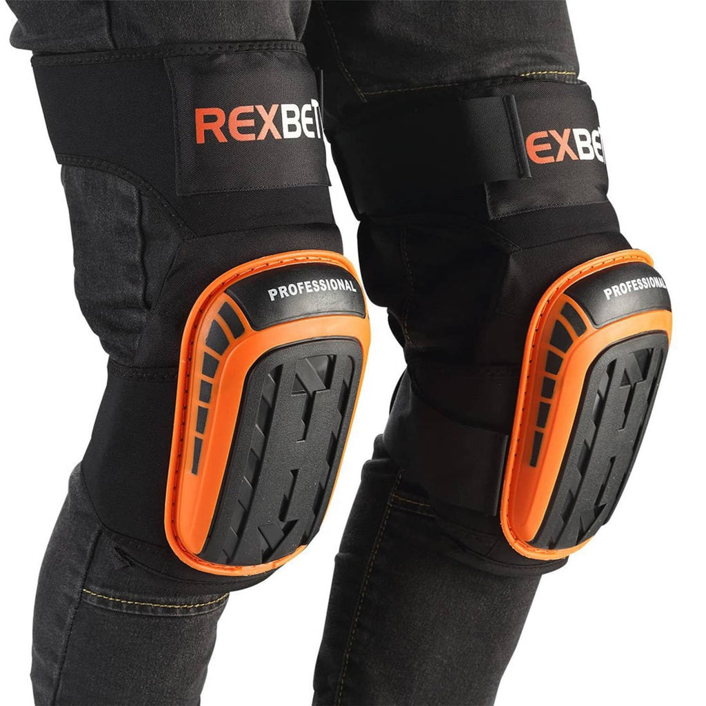 Black knee pads with orange trim and rugged hard-shell protectors over work pants