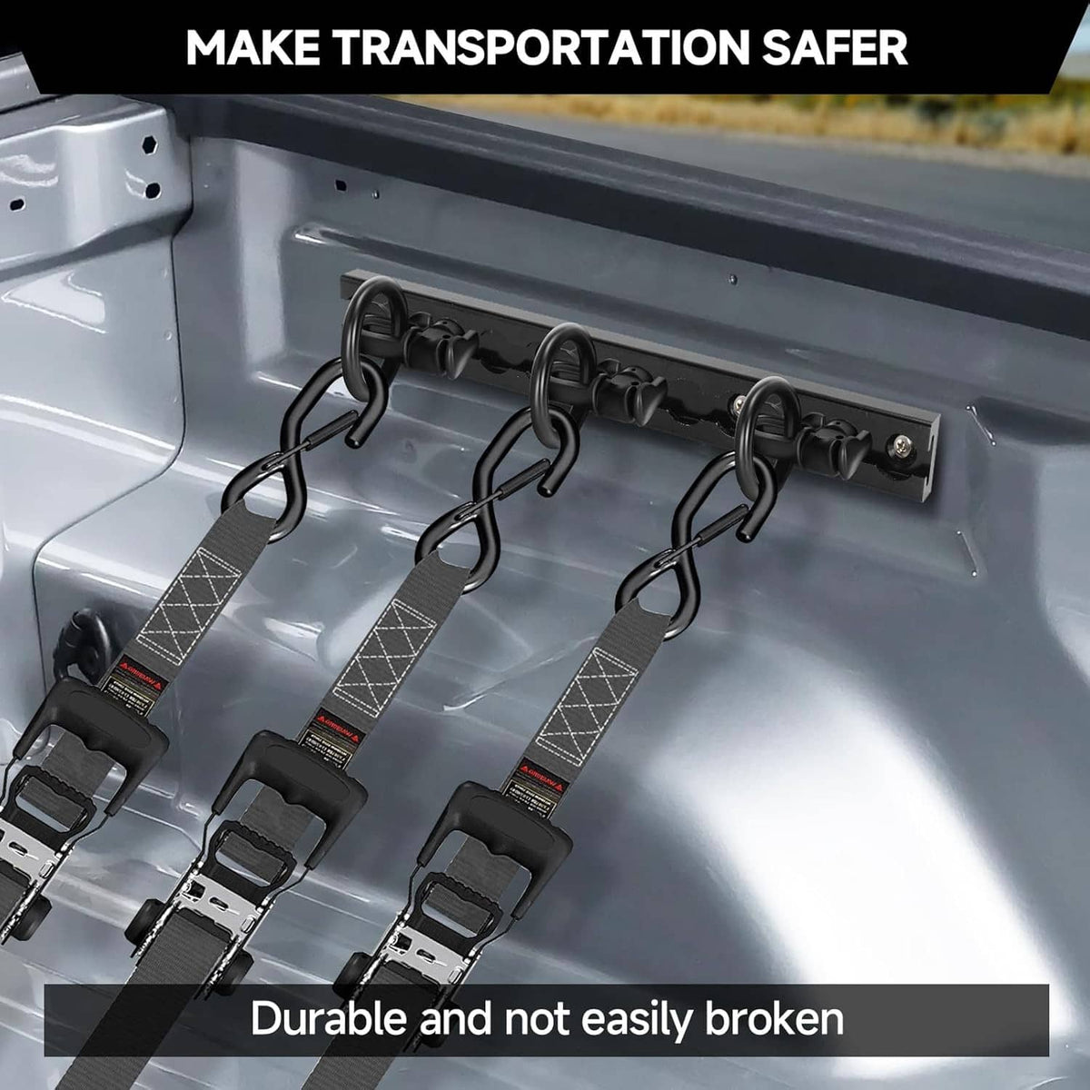 Black O-ring tie-down loops with double-stud mounts on a vehicle rail