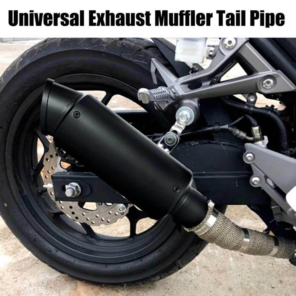 Black motorcycle exhaust muffler with slip-on tailpipe and heat shield wrap.