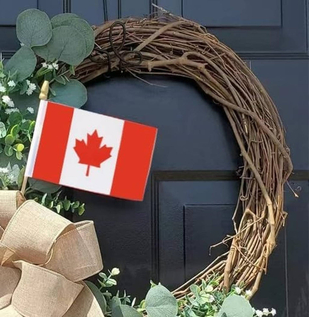 Canada mini stick flag with maple leaf, red-and-white fabric on wooden pole