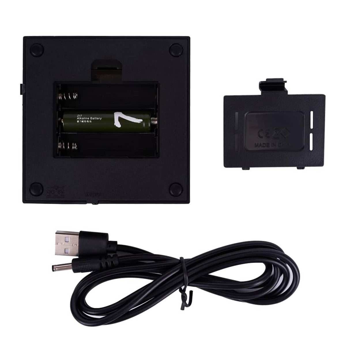 Black LED light stand base back view with battery compartment and power cable