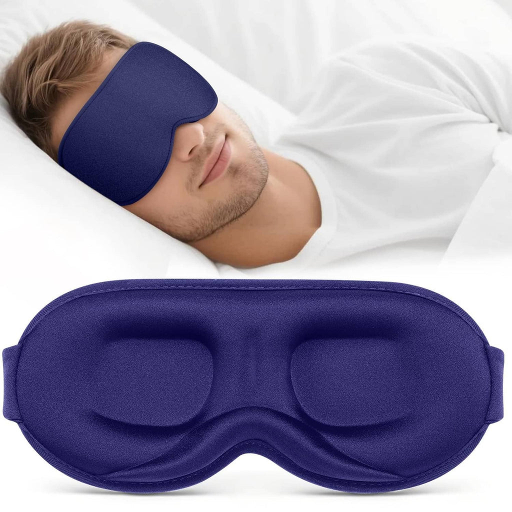 Blue sleep mask lying on a white surface with soft contoured eye padding