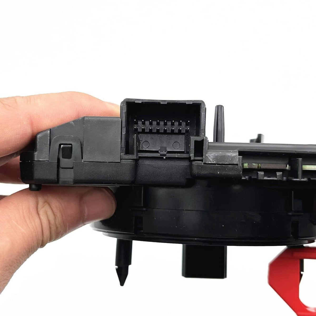 Clock spring assembly connector section, black housing with multi-pin plug and red tag