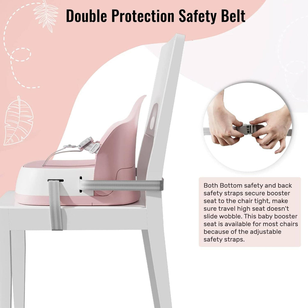 Pink booster seat secured with double safety belt straps on a chair