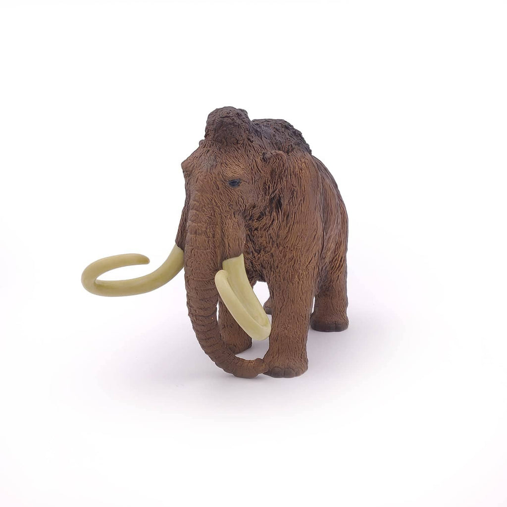 Woolly mammoth toy with ivory tusk, standing rear view